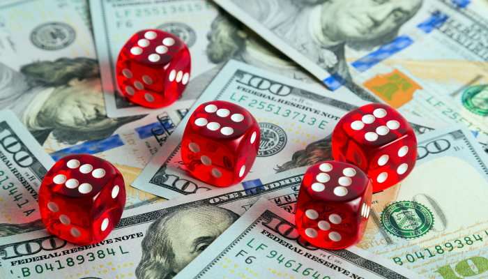 red die on dollar bills